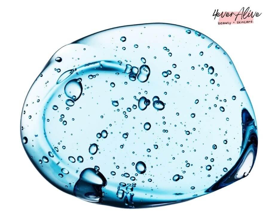 Soothing Aloe Body Wash for Sensitive Skin blue gel with bubbles representing hydration and soothing effects.