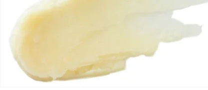 Close-up of a premium beard balm formulation on a white background