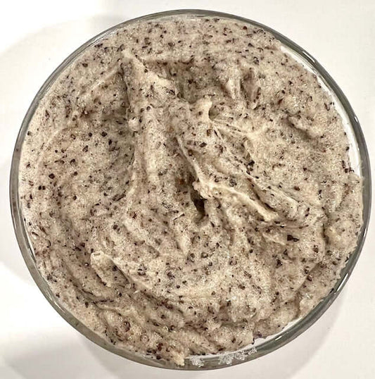 Coffee Sugar Scrub – Exfoliating Spa & Salon Skincare in a glass bowl, featuring a creamy texture with visible coffee grounds.
